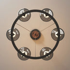 Lustre industriel en métal noir avec abat-jour en verre gris