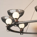 Lustre industriel en métal noir avec abat-jour en verre gris