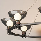 Lustre industriel en métal noir avec abat-jour en verre gris