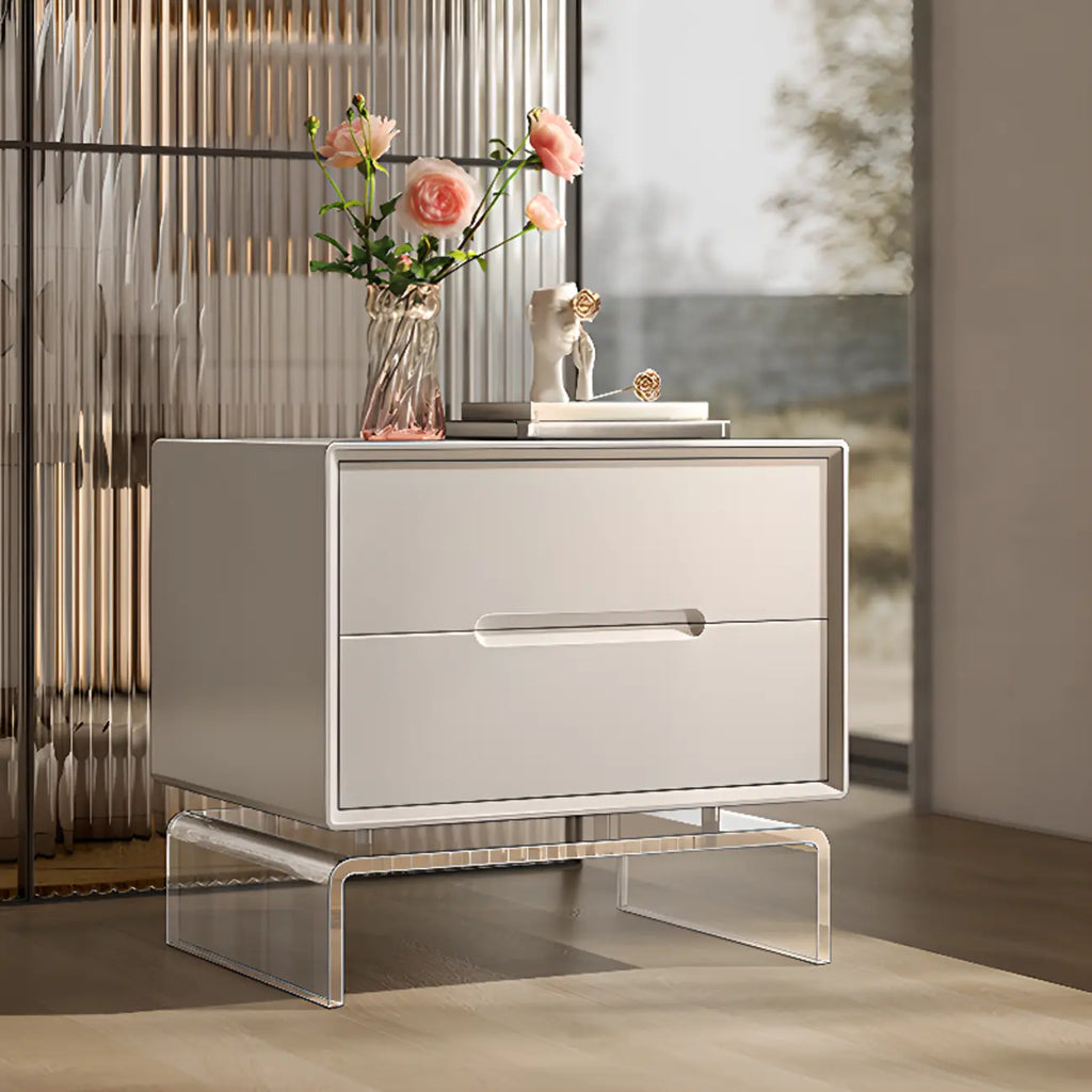 Table de chevet moderne en bois blanc avec pieds en acrylique et tiroirs