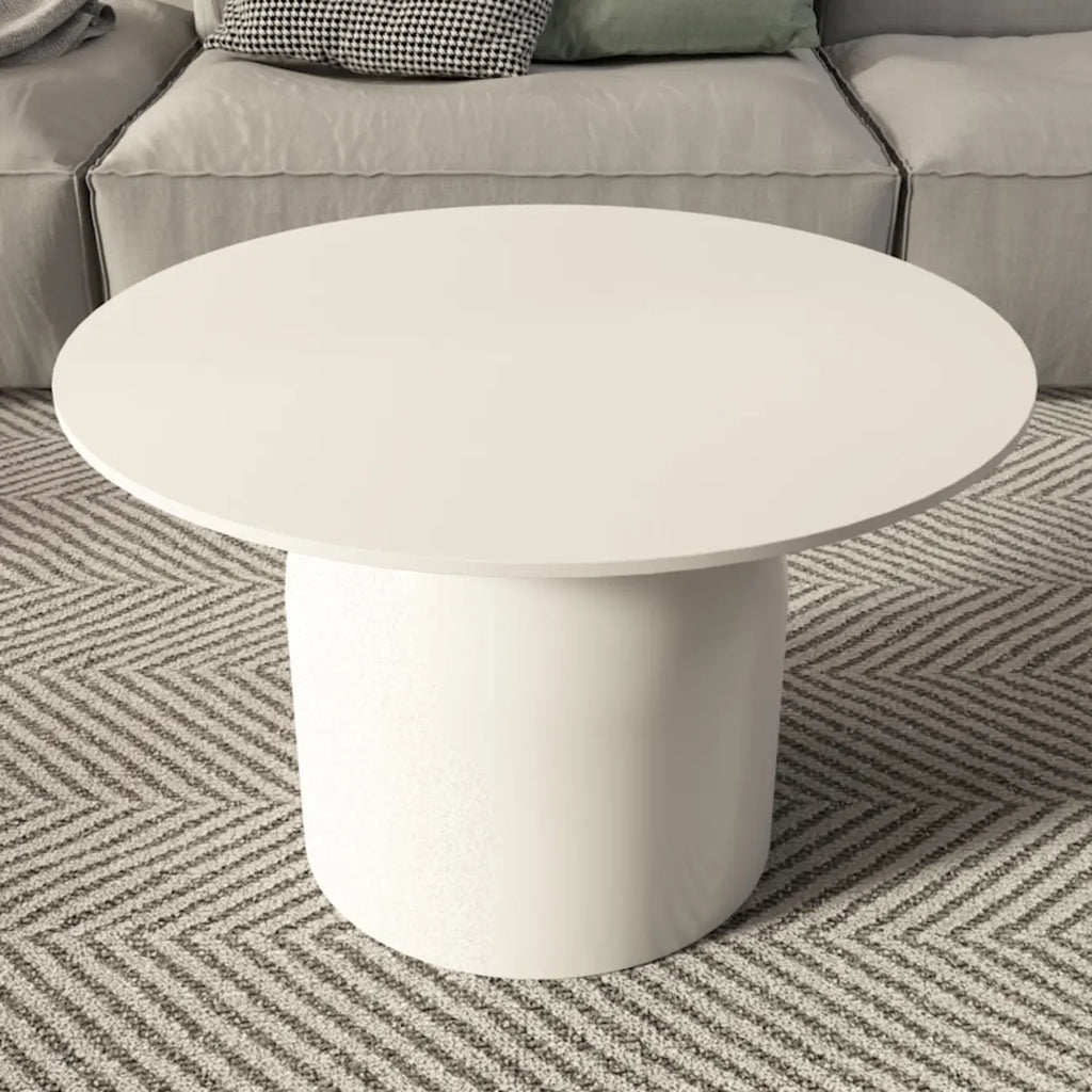 Table basse ronde minimaliste blanche avec plateau en pierre
