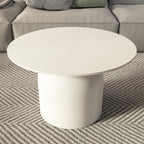 Table basse ronde minimaliste blanche avec plateau en pierre