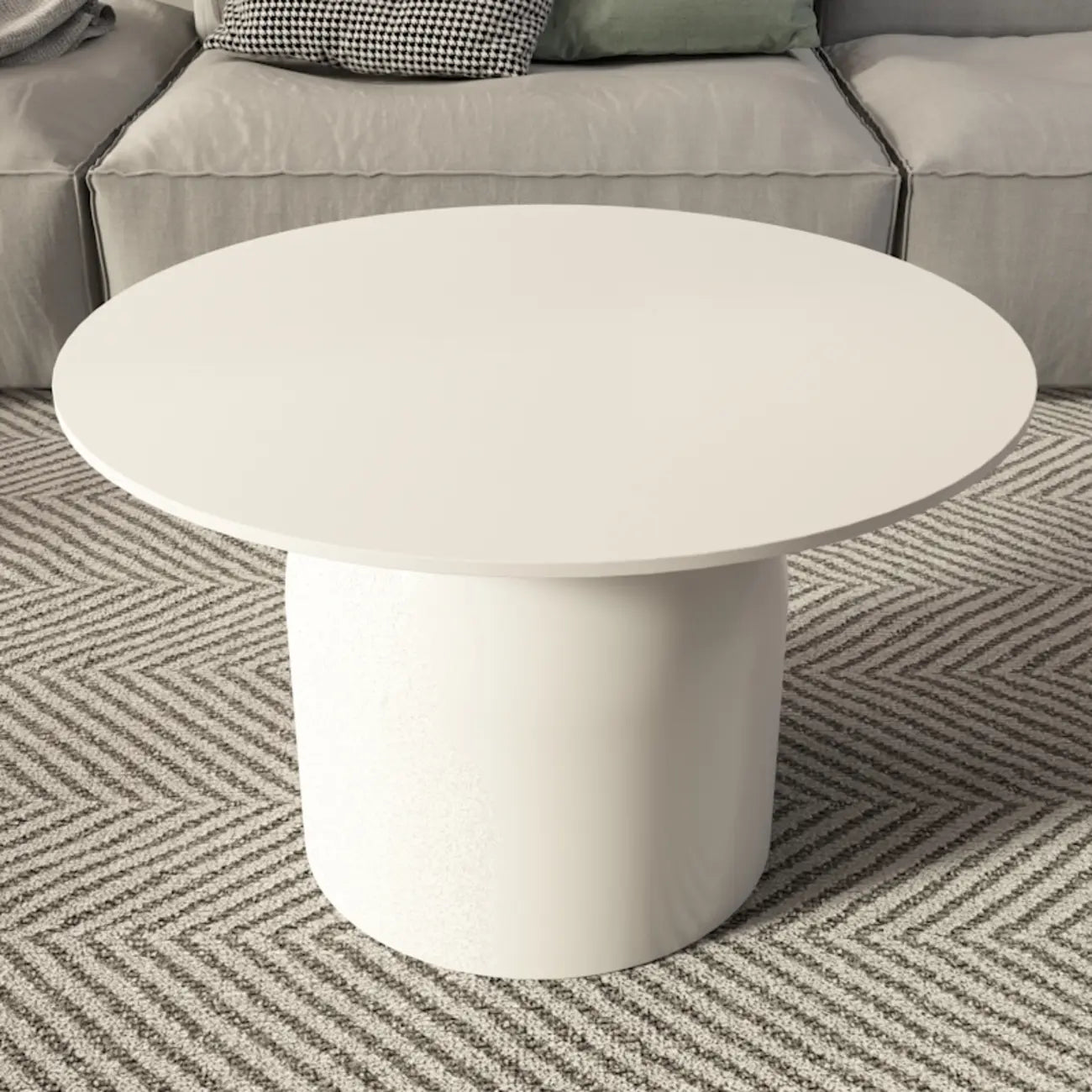 Table basse ronde minimaliste blanche avec plateau en pierre