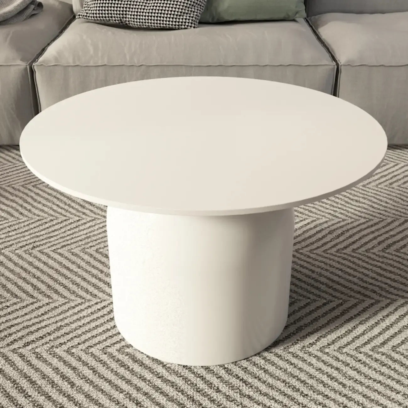 Table basse ronde minimaliste blanche avec plateau en pierre