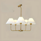 Lustre moderne doré avec abat-jour plissés pour salon