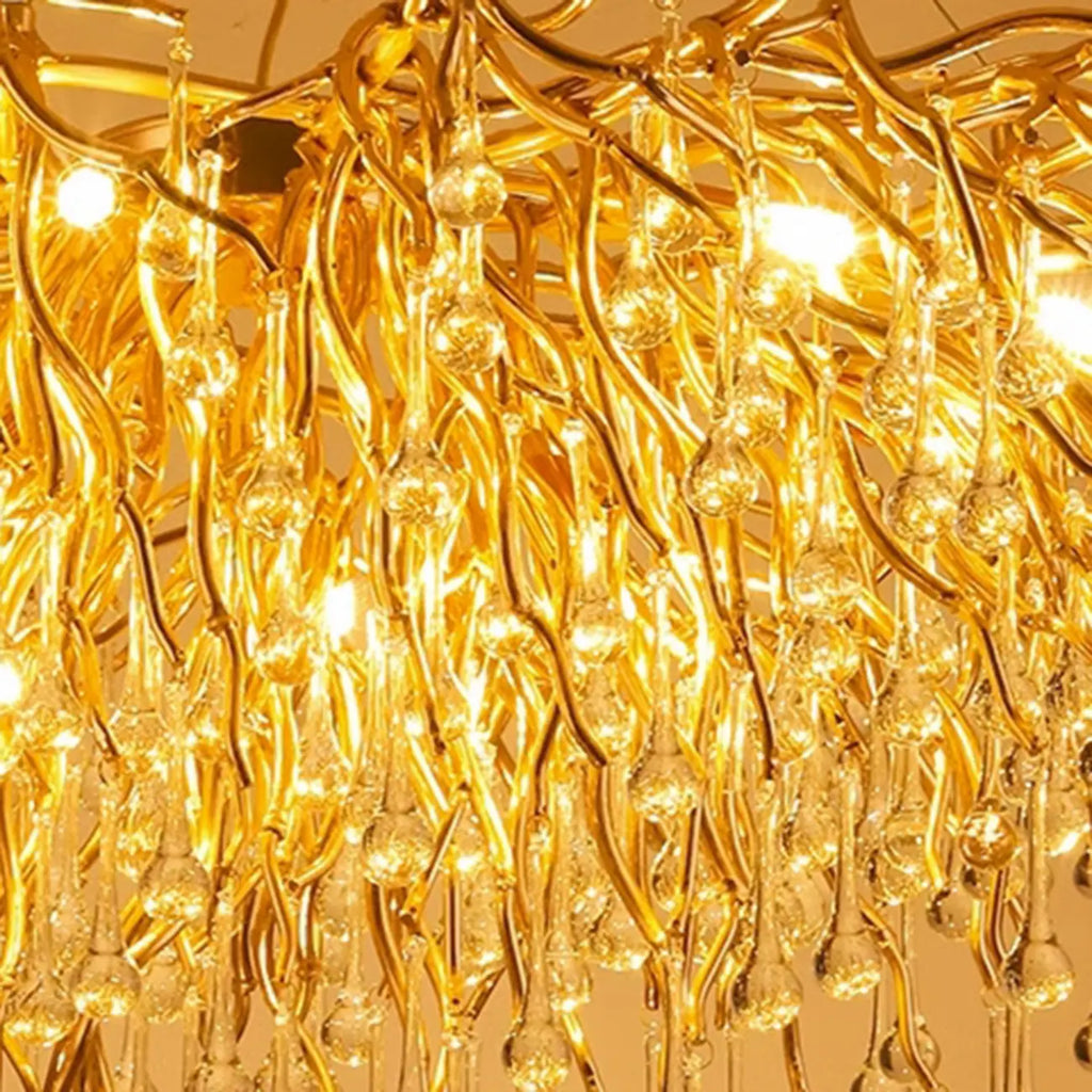 Lustre moderne en cristal avec branches dorées pour salle à manger