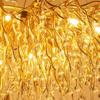 Lustre moderne en cristal avec branches dorées pour salle à manger