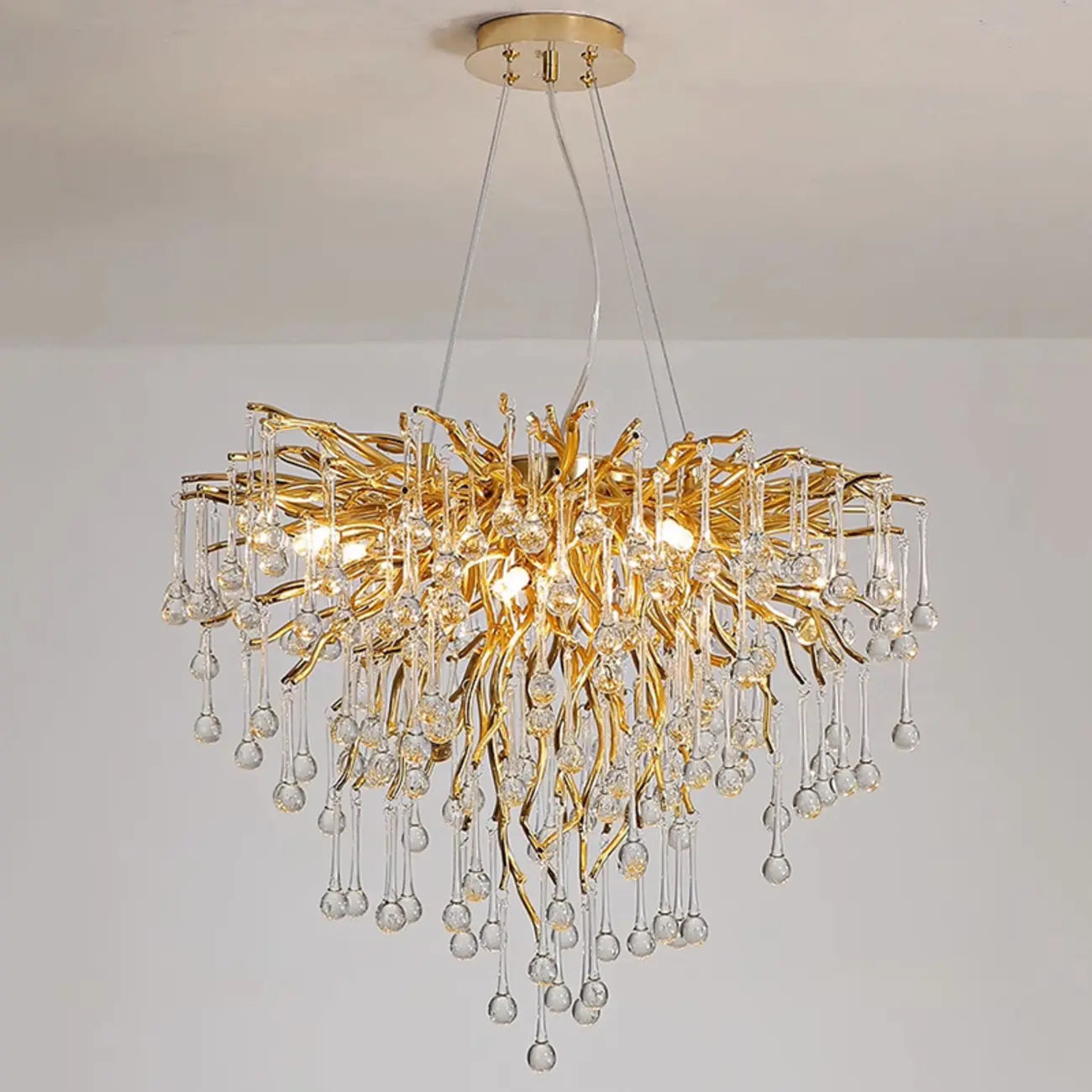 Lustre moderne en cristal avec branches dorées pour salle à manger