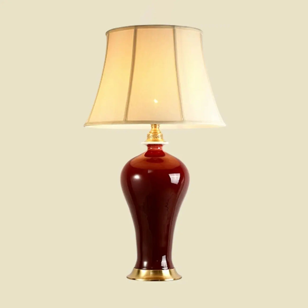 Lampe de table géométrique en céramique rouge avec interrupteur à bouton et abat-jour en tissu