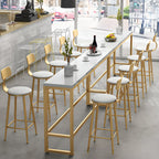 Ensemble table de bar élégant en faux marbre avec chaises rembourrées
