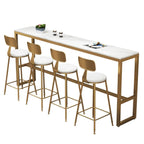 Table de bar glamour en faux marbre avec pieds dorés pour les repas