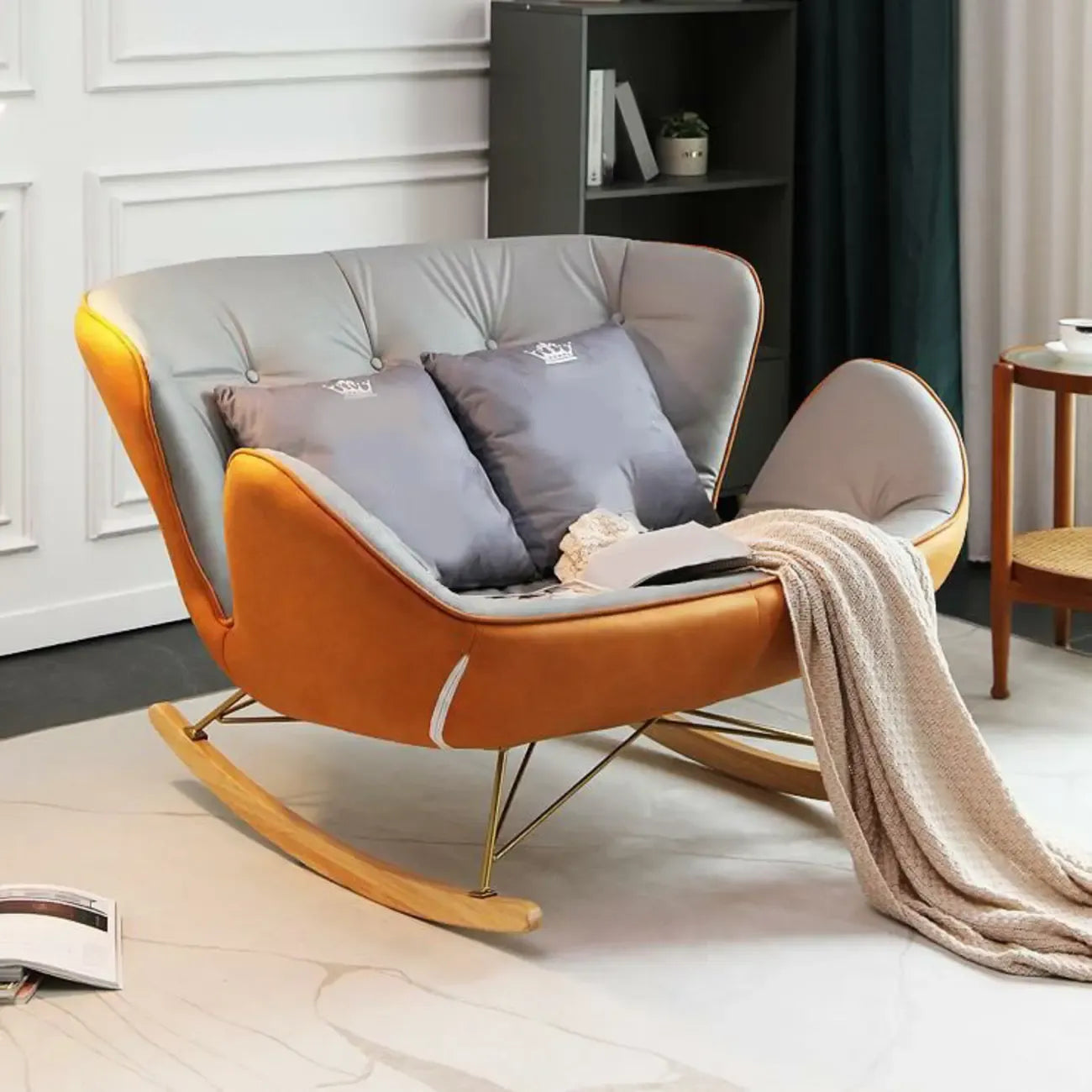 Fauteuil à bascule rembourré avec coussin pour salon