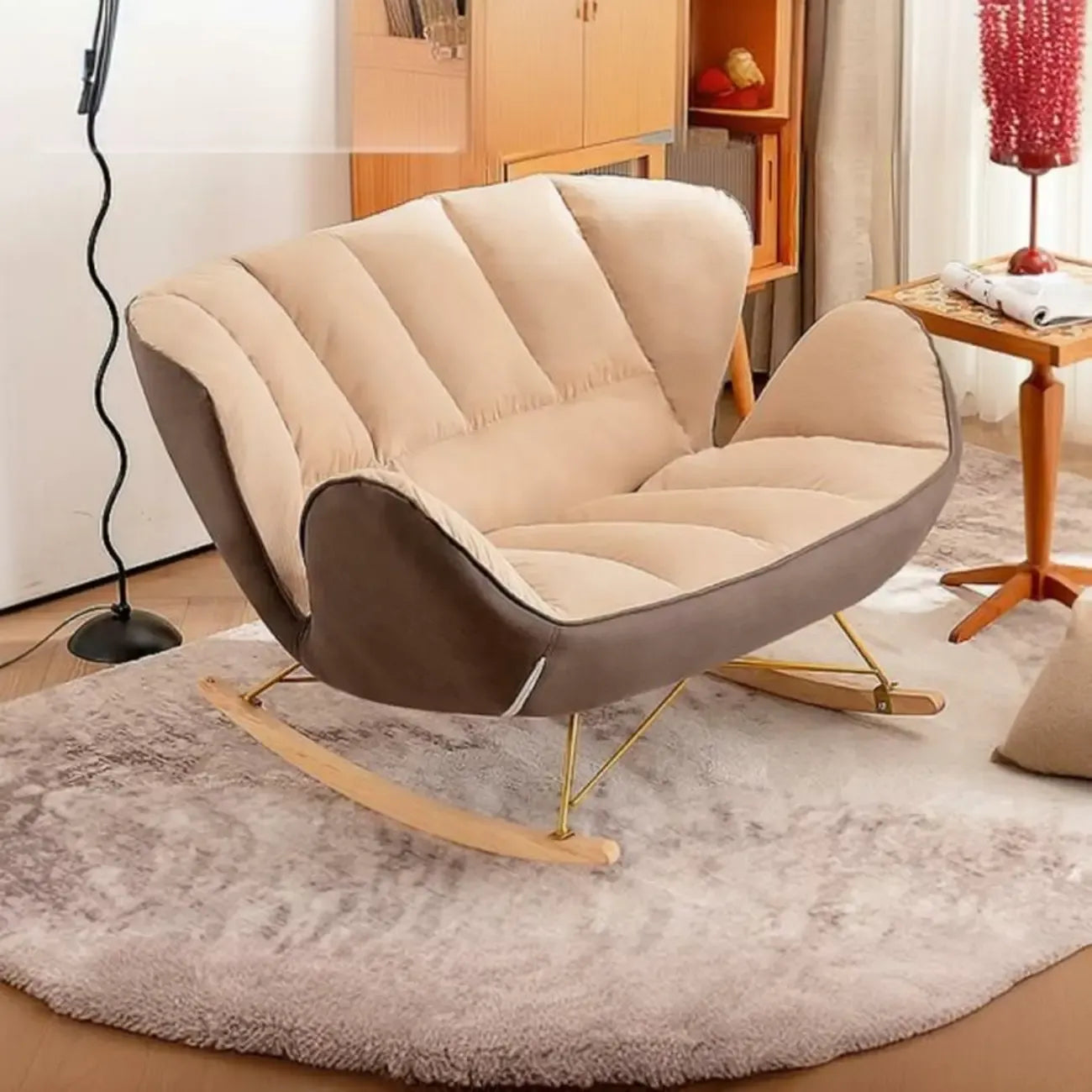 Fauteuil à bascule rembourré avec coussin pour salon