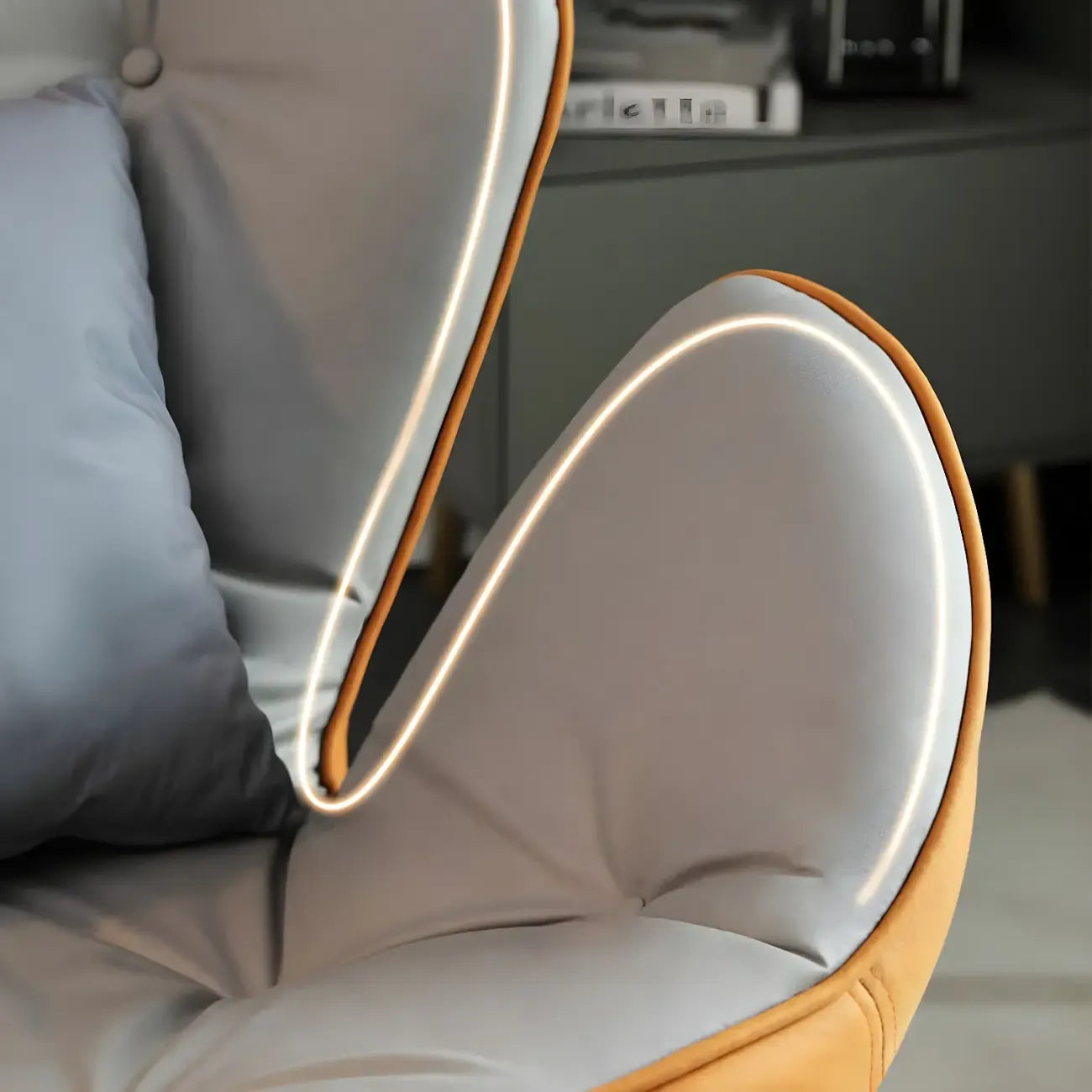 Fauteuil à bascule rembourré avec coussin pour salon