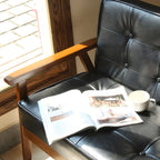 Fauteuil d'appoint moderne en cuir capitonné avec structure en bois