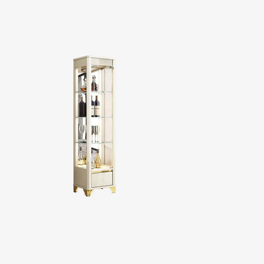 Élégante vitrine en verre avec pieds noirs et dorés