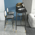 Table de bar design en métal noir avec repose-pieds doré pour intérieur moderne