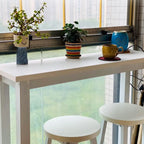 Table de bar moderne avec plateau en bois et pieds en métal