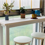 Table de bar moderne avec plateau en bois et pieds en métal