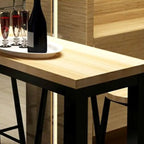 Table de bar moderne avec plateau en bois et pieds en métal