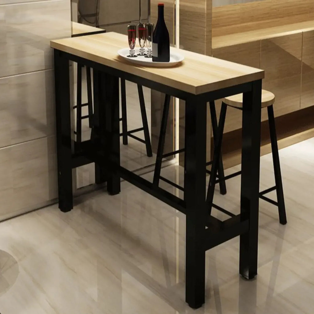 Table de bar moderne avec plateau en bois et pieds en métal