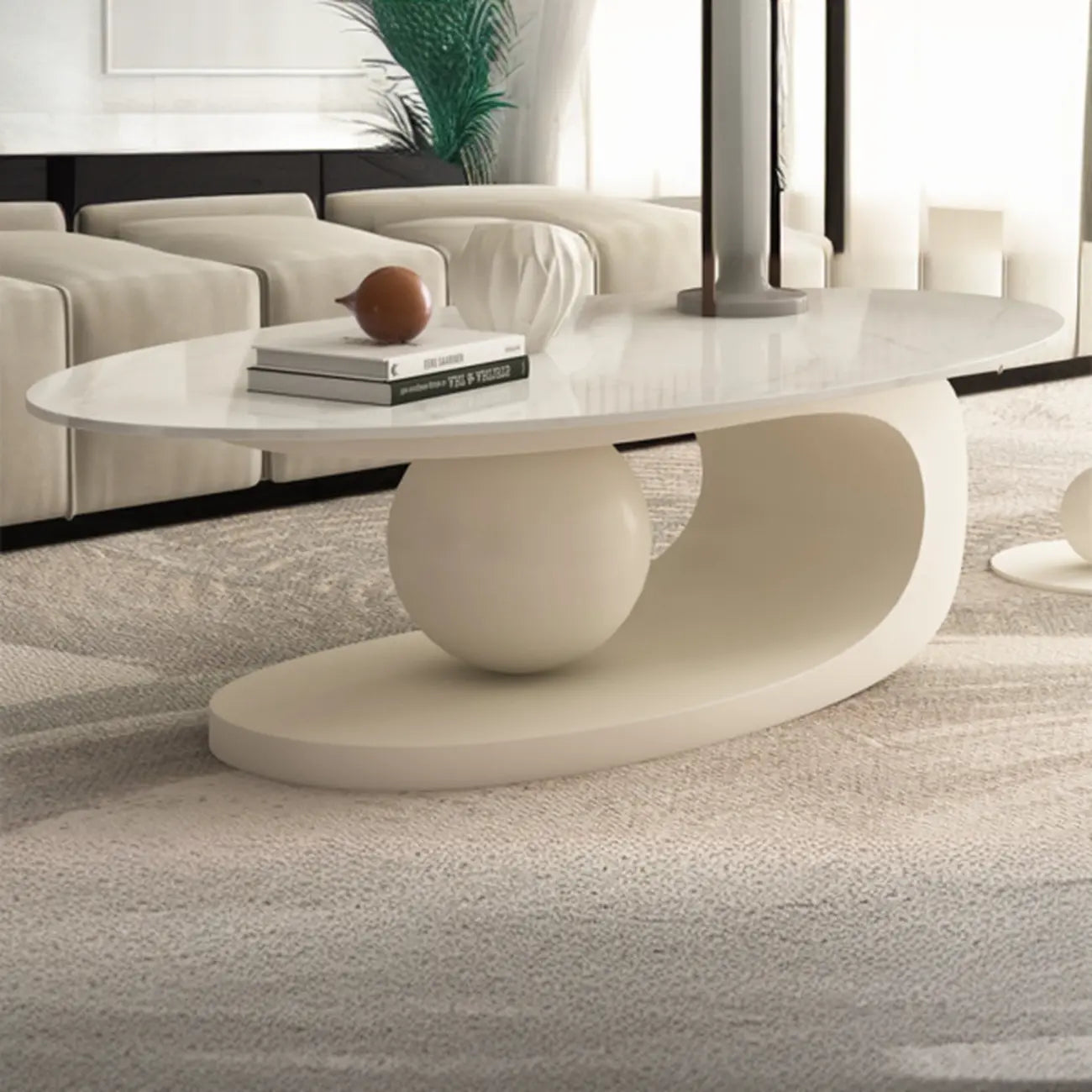 Table basse ovale blanche moderne et luxueuse avec piètement en métal