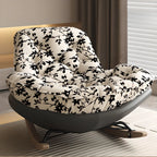 Fauteuil à bascule rembourré moderne pour salons élégants