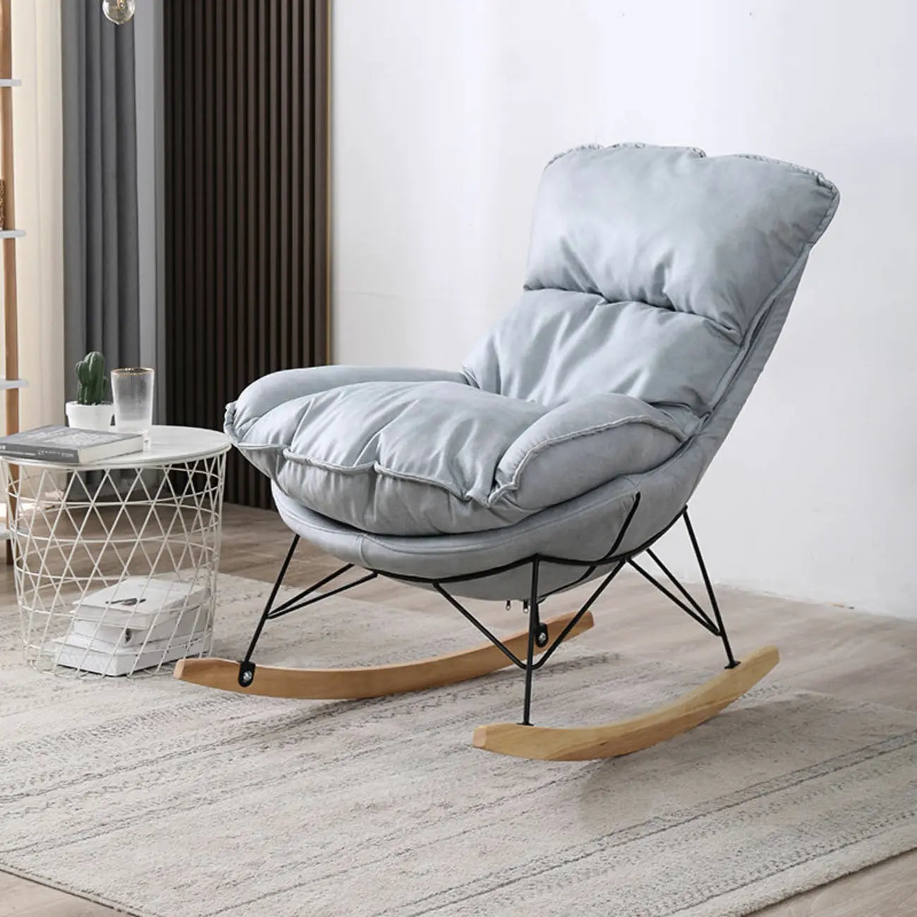 Fauteuil à bascule recouvert de coton avec coussins amovibles