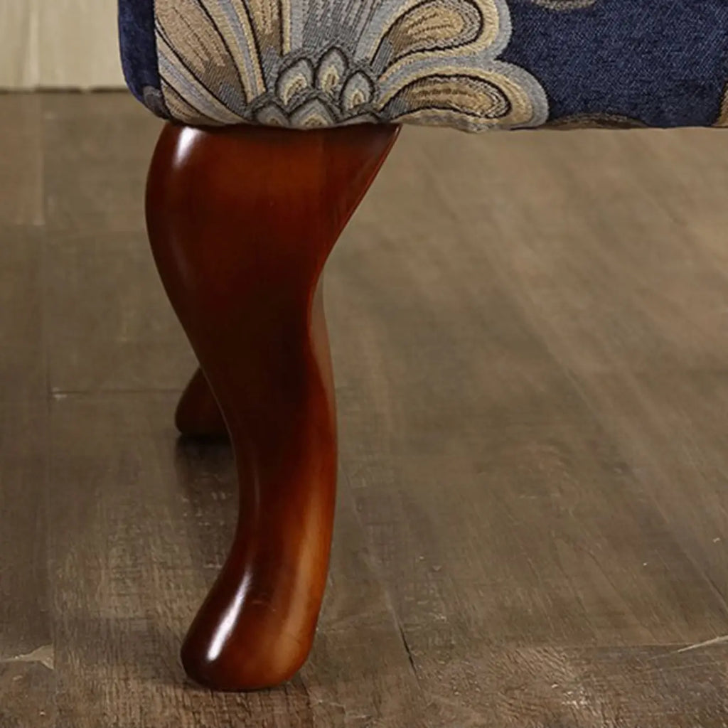 Fauteuil à oreilles traditionnel en tissu avec repose-pieds pour salon