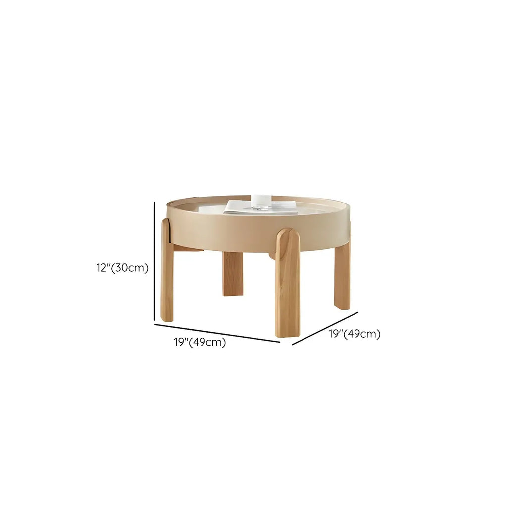 Table basse ronde minimaliste en bois beige avec plateau