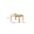 Table basse ronde minimaliste en bois beige avec plateau