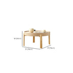 Table basse ronde minimaliste en bois beige avec plateau