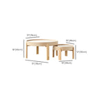 Table basse ronde minimaliste en bois beige avec plateau