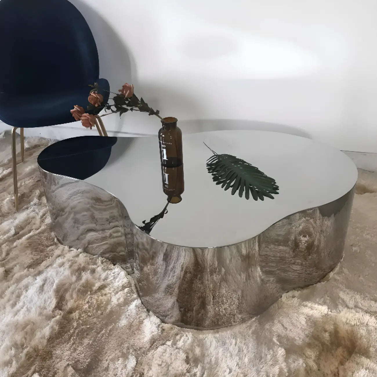 Table basse moderne abstraite en métal et miroir
