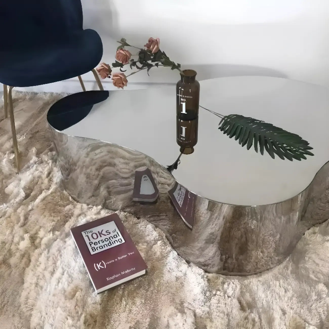 Table basse moderne abstraite en métal et miroir