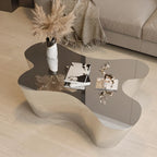 Table basse moderne abstraite en métal et miroir