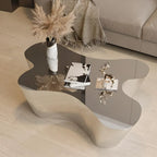 Table basse moderne abstraite en métal et miroir