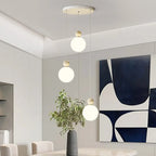 Suspension ronde design en forme de lune avec détails perlés pour la décoration intérieure