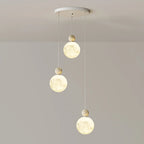 Suspension ronde design en forme de lune avec détails perlés pour la décoration intérieure