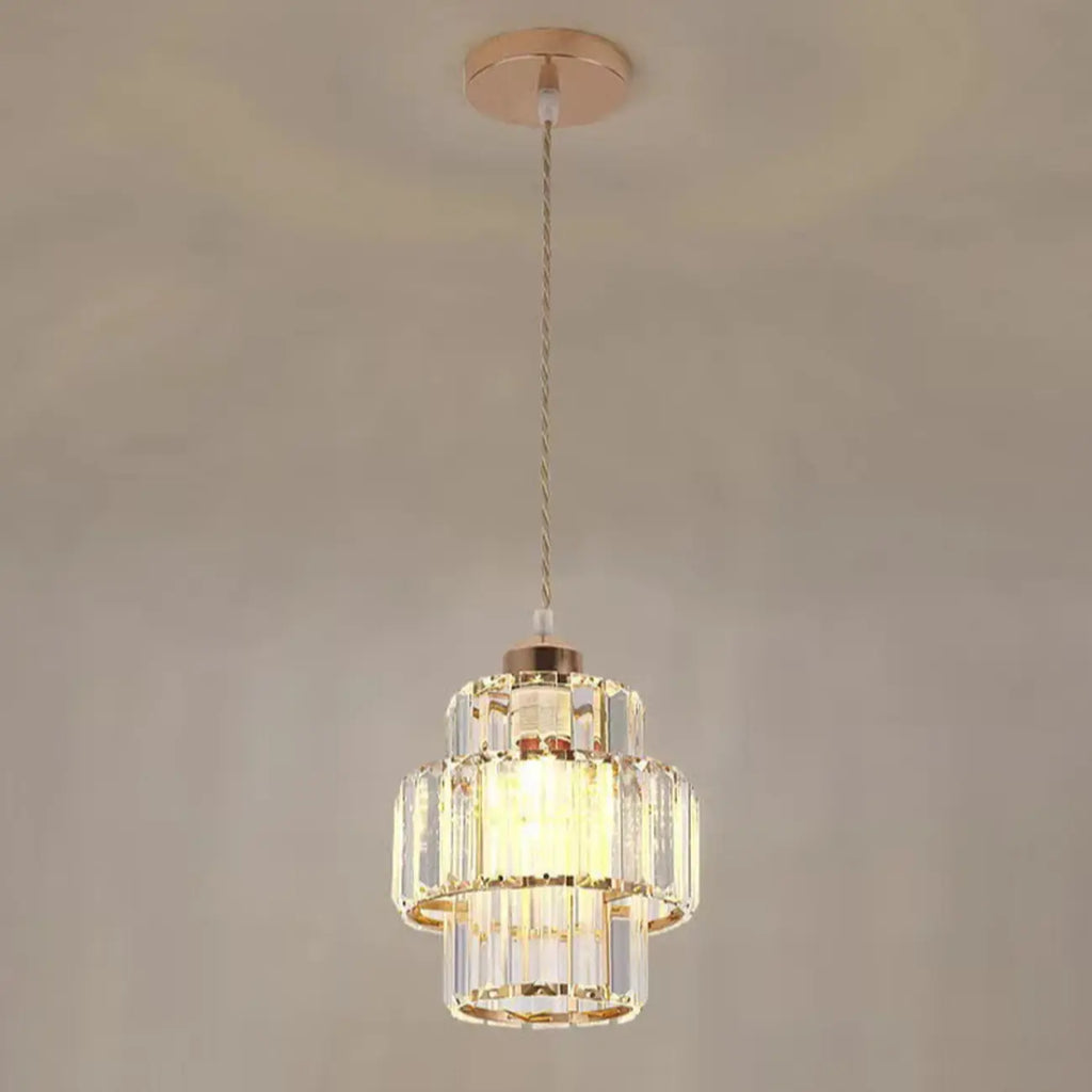 Elegante lampada a sospensione cilindrica in cristallo trasparente per sala da pranzo