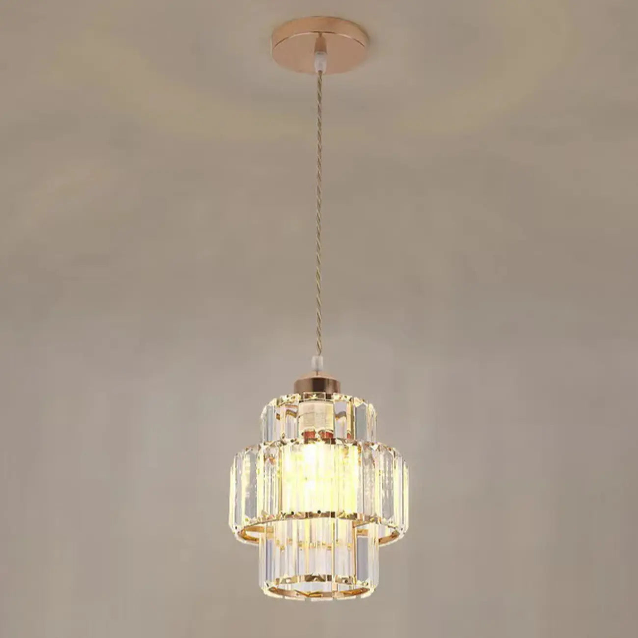 Elegante lampada a sospensione cilindrica in cristallo trasparente per sala da pranzo