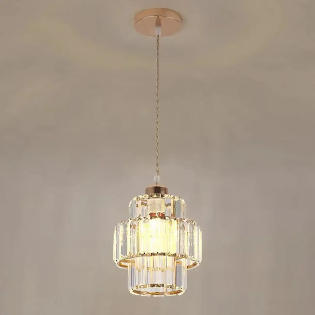 Elegante lampada a sospensione cilindrica in cristallo trasparente per sala da pranzo