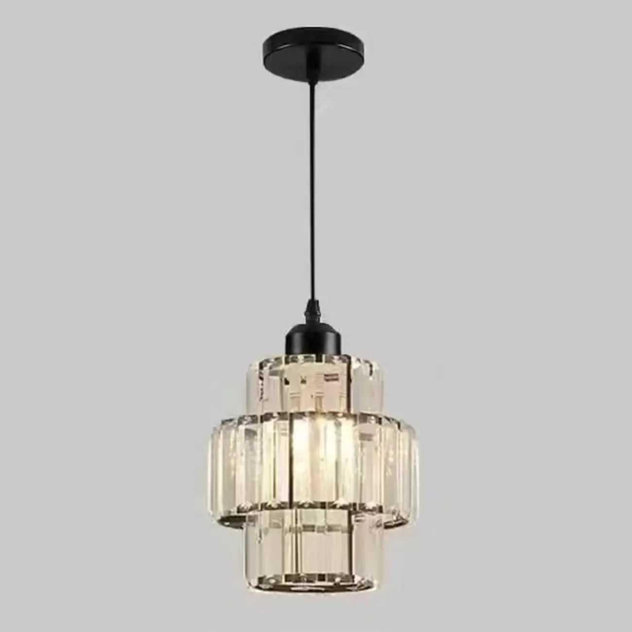 Elegante lampada a sospensione cilindrica in cristallo trasparente per sala da pranzo