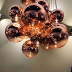 Lampadario a 3 luci con mini sfere in vetro a LED dal design moderno