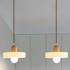 Lampe suspendue LED ronde élégante en verre crème pour chevet