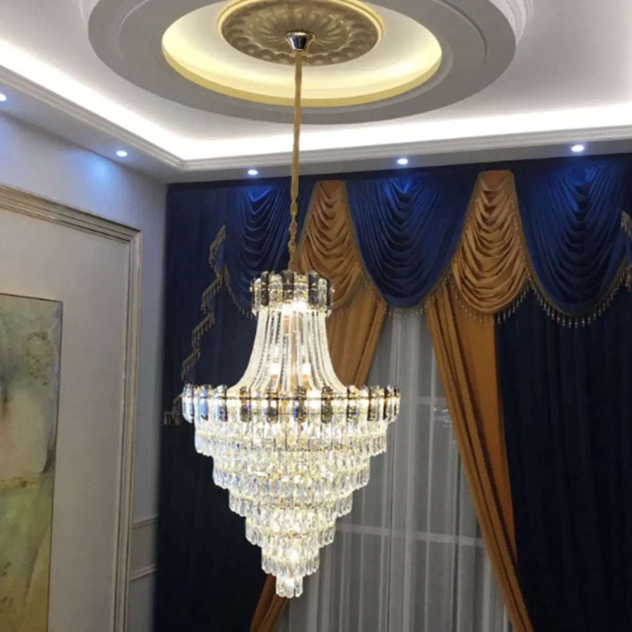 Lustre luxueux en cristal doré à long cascade