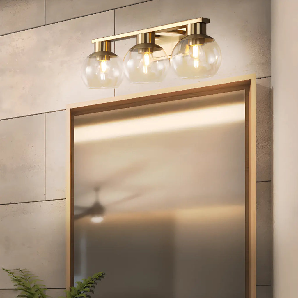Appliques de salle de bain classiques en laiton avec abat-jour sphérique transparent