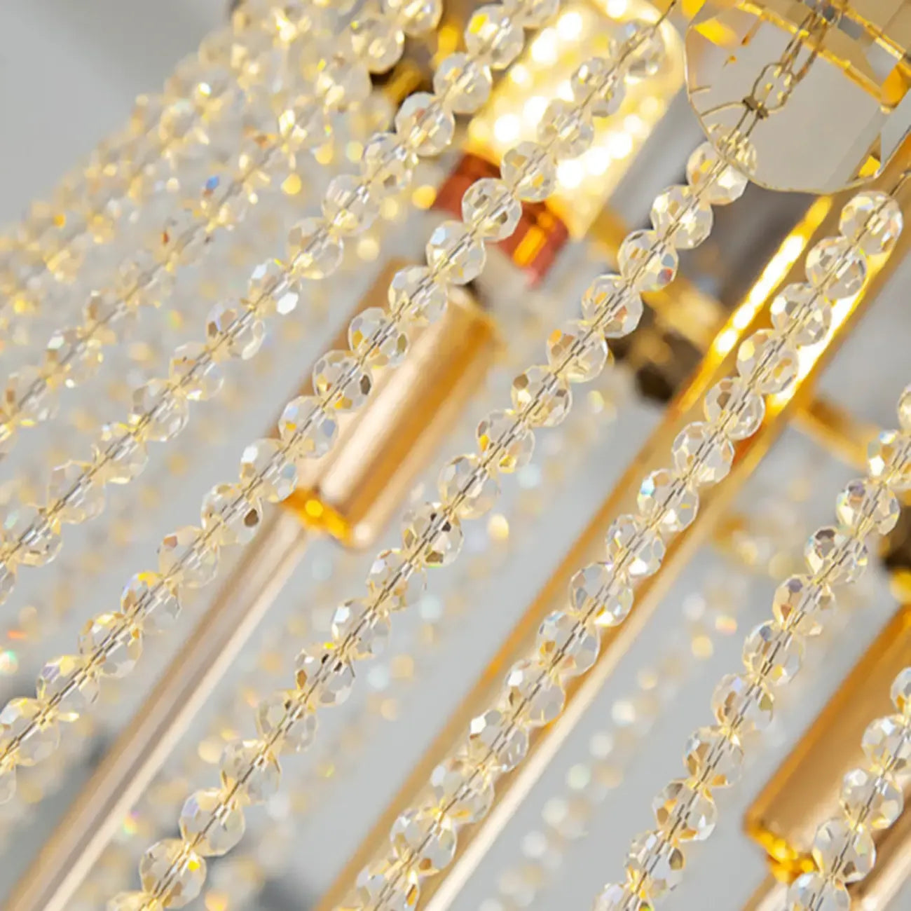 Lustre luxueux en cristal doré à long cascade