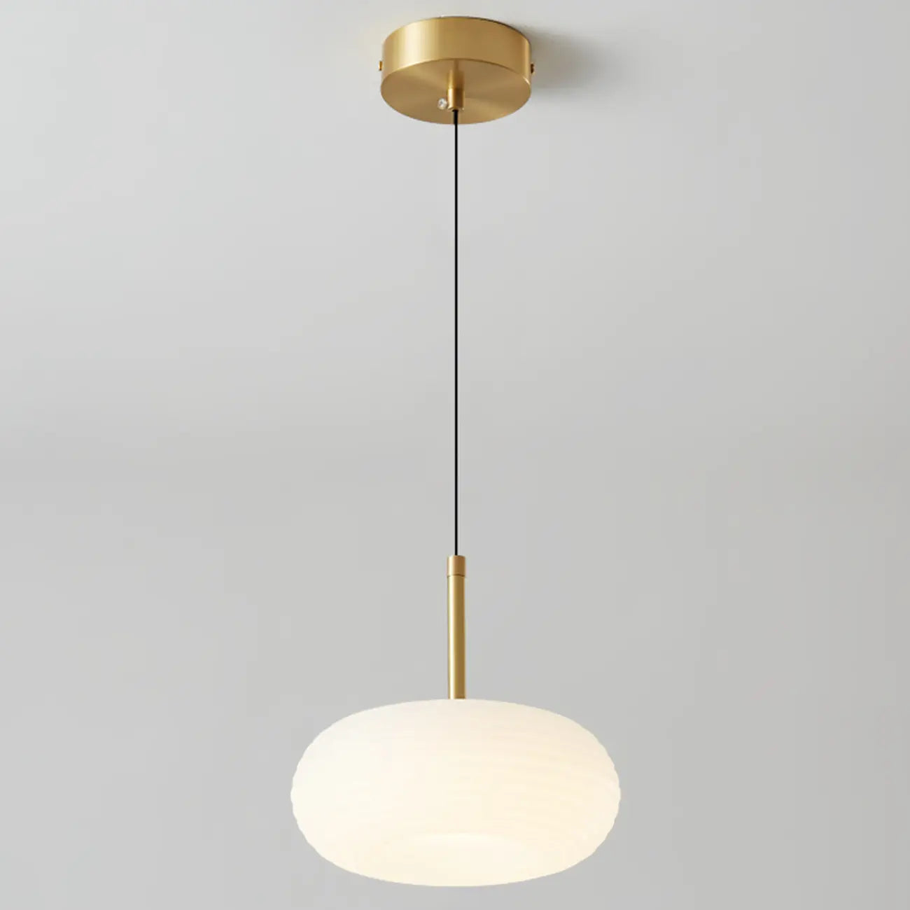 Suspension LED en forme de galet en acrylique crème pour salon