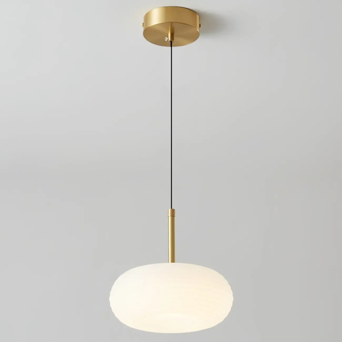 Suspension LED en forme de galet en acrylique crème pour salon